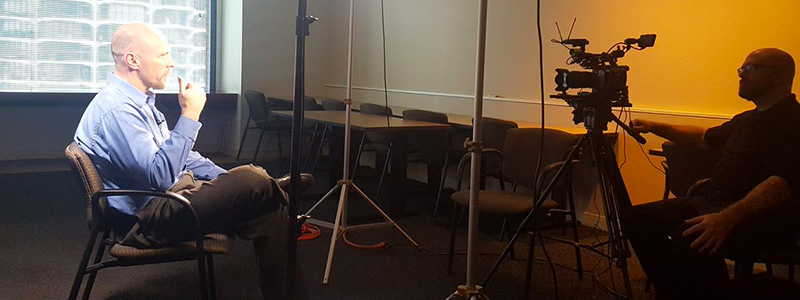 Conrad being interviewed on camera