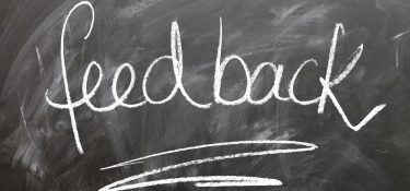 Feedback written on a chalkboard