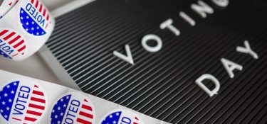 I voted stickers and voting day sign